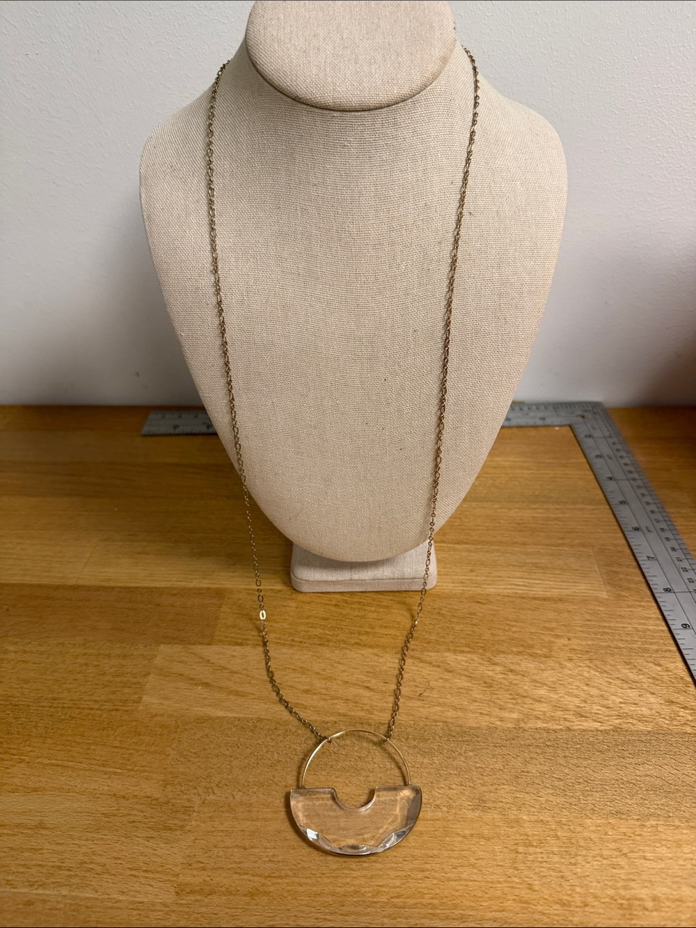 Long gold tone chain with large circle clear crystal statement pendant